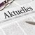 Zeitung mit der Überschrift Aktuelles Zeitung mit der Überschrift Aktuelles