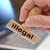 Hand und Stempel mit Aufschrift Illegal